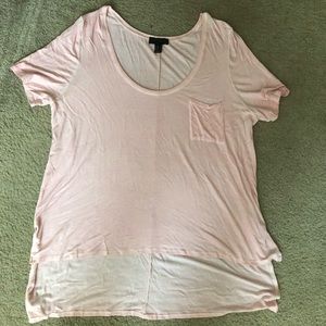 Light pink shorter in the front then the back